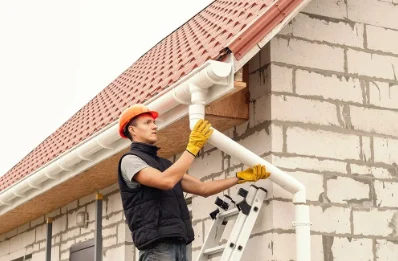 Pose et remplacement de gouttières au Héron